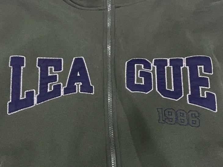 Applique fabric for embroidery on custom apparel