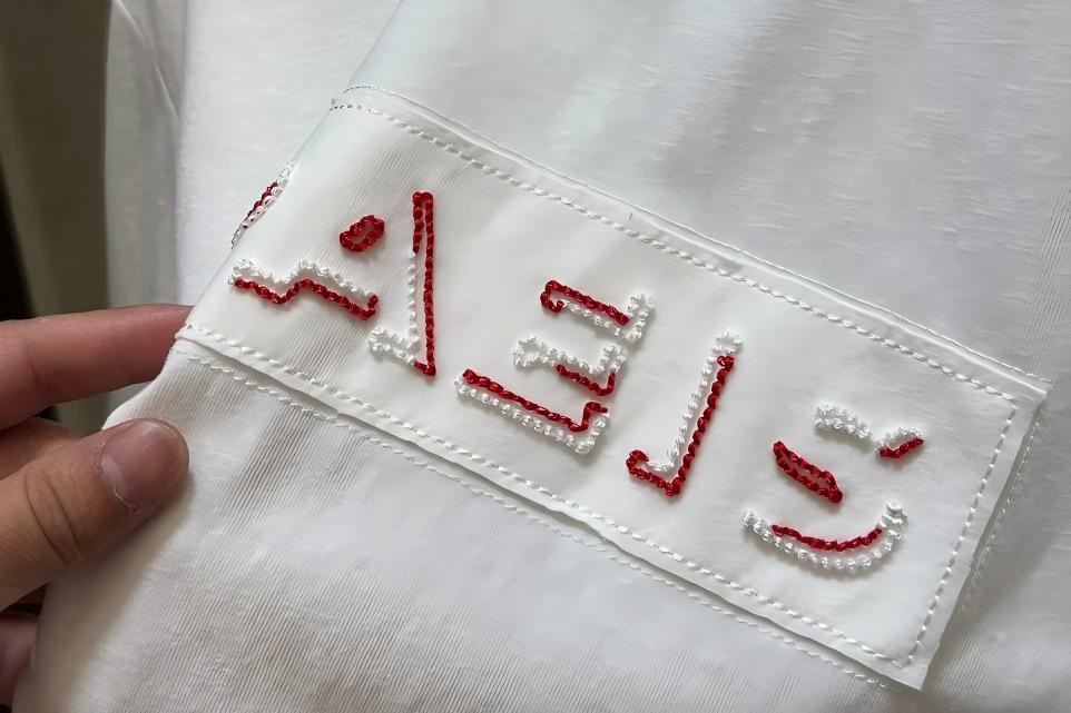 Chain stitch machine embroidery for garment manufacturing
