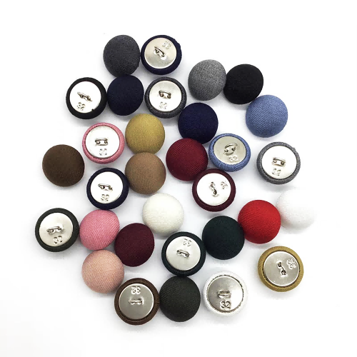 Custom buttons for fashion apparel manufacturing
