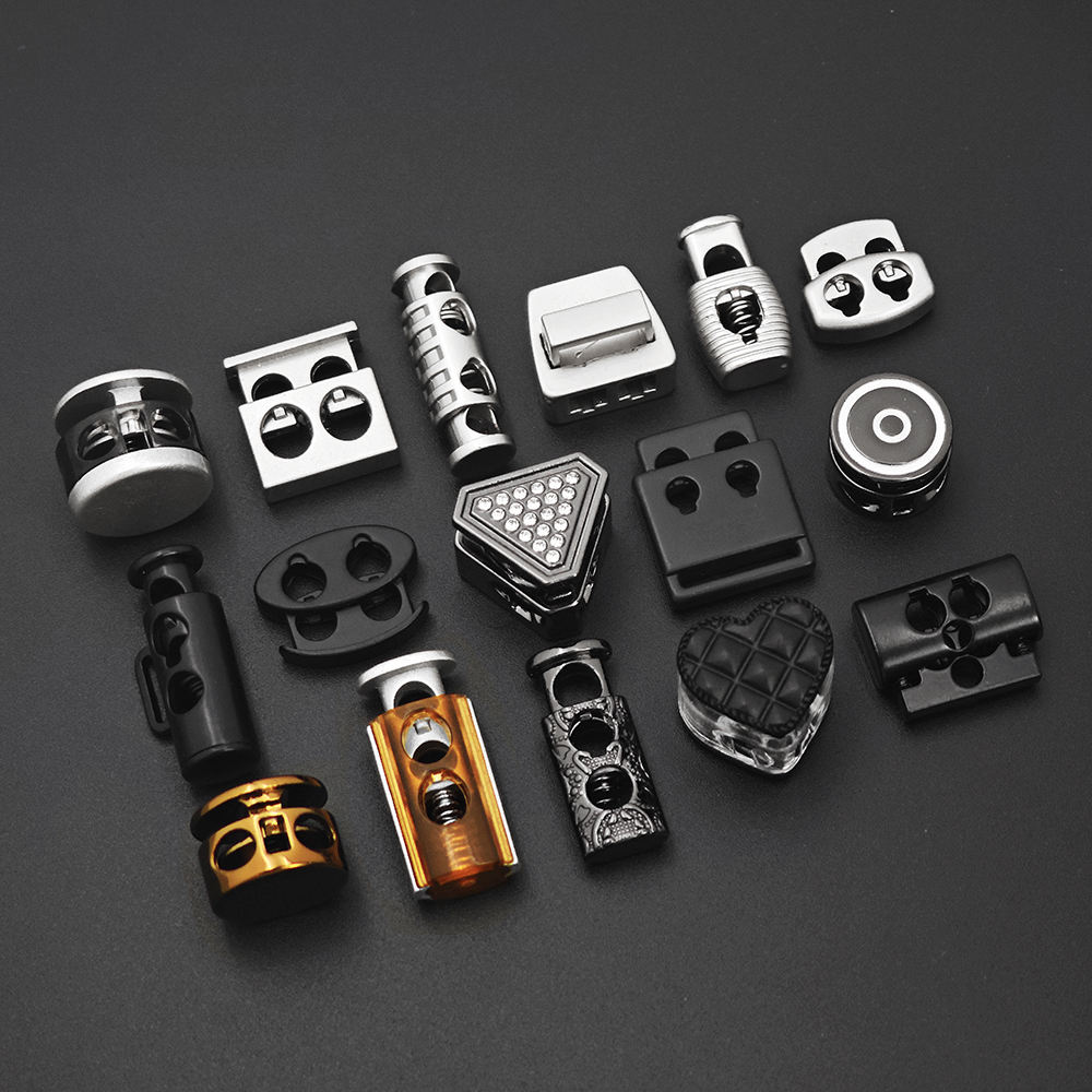 Drawstring cord locks for garment production