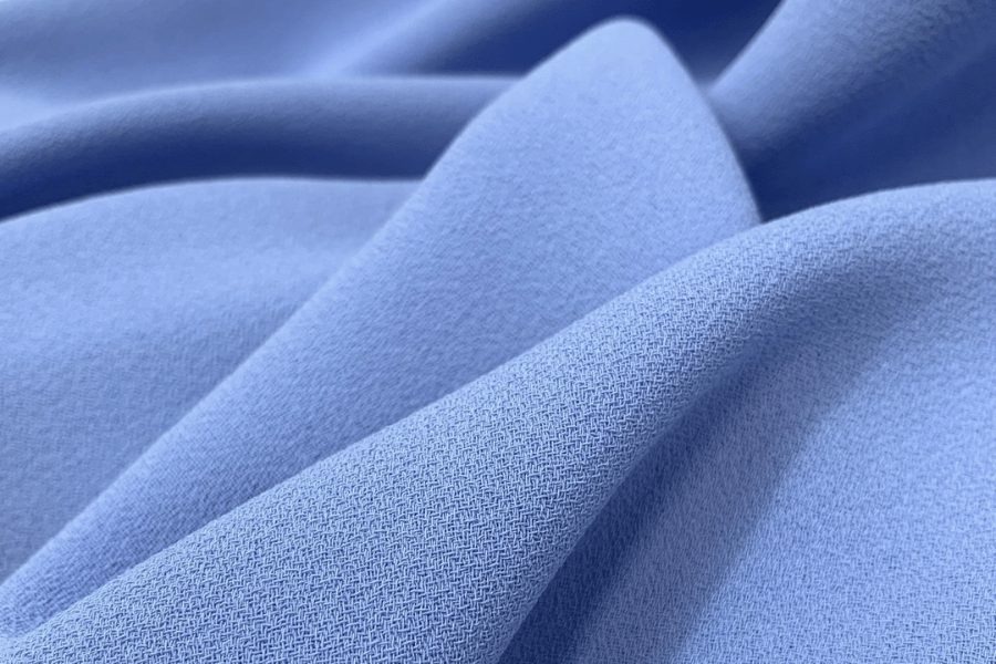 Crepe fabric textile for garment manufacturing