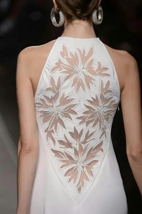 Dress with eyelet embroidery detail