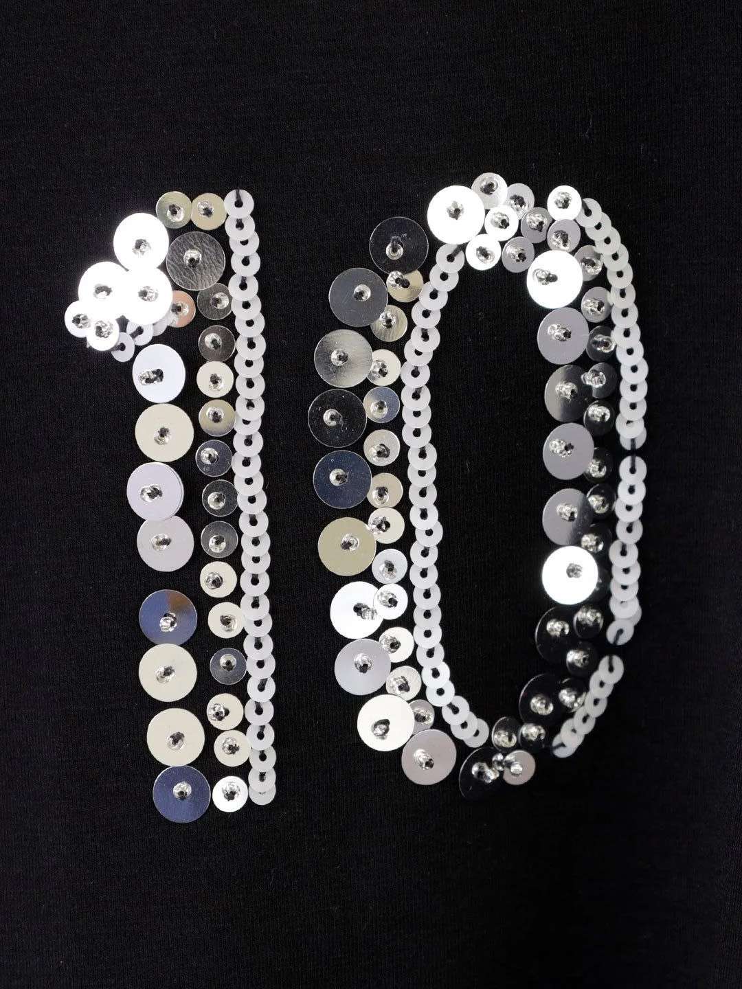 Embroidery with beads and sequins decoration