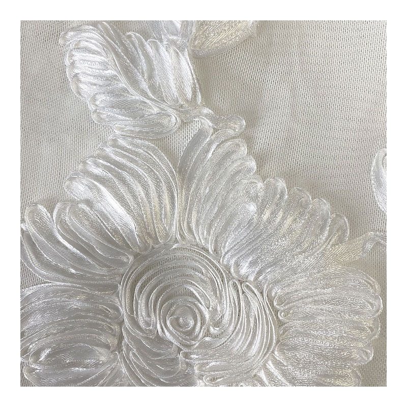 Embroidery with ribbons on apparel