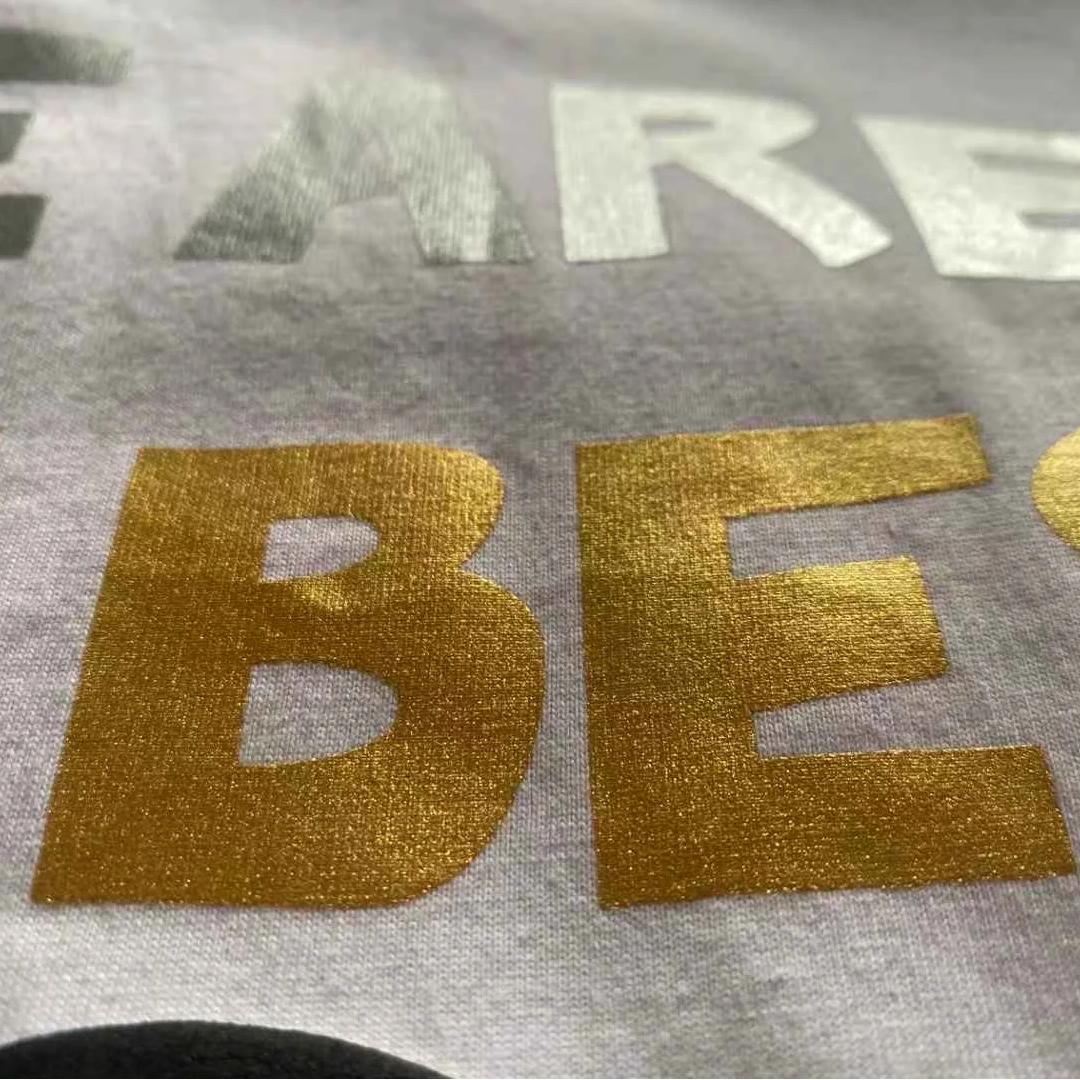 Foil press printing on custom garments