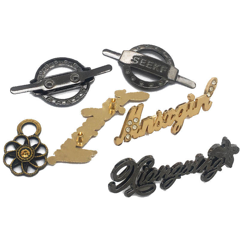 Metal brand label for garment manufacturing