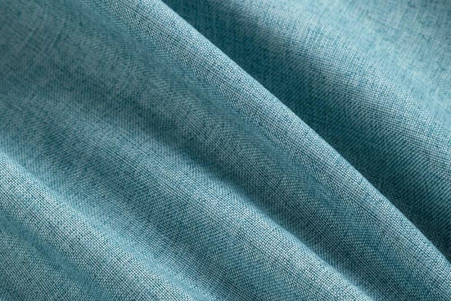 Plain weave fabric for garment manufacturing