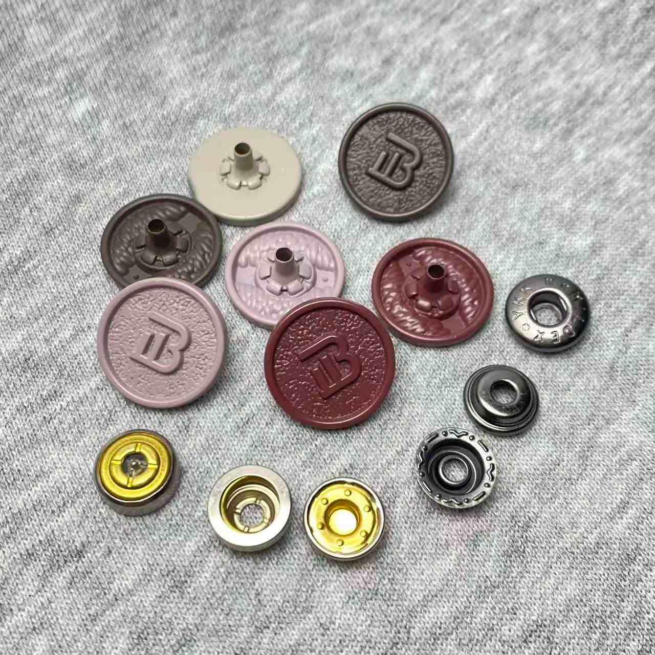 Snap buttons for custom apparel manufacturing