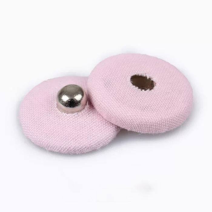 Snap buttons for custom apparel manufacturing