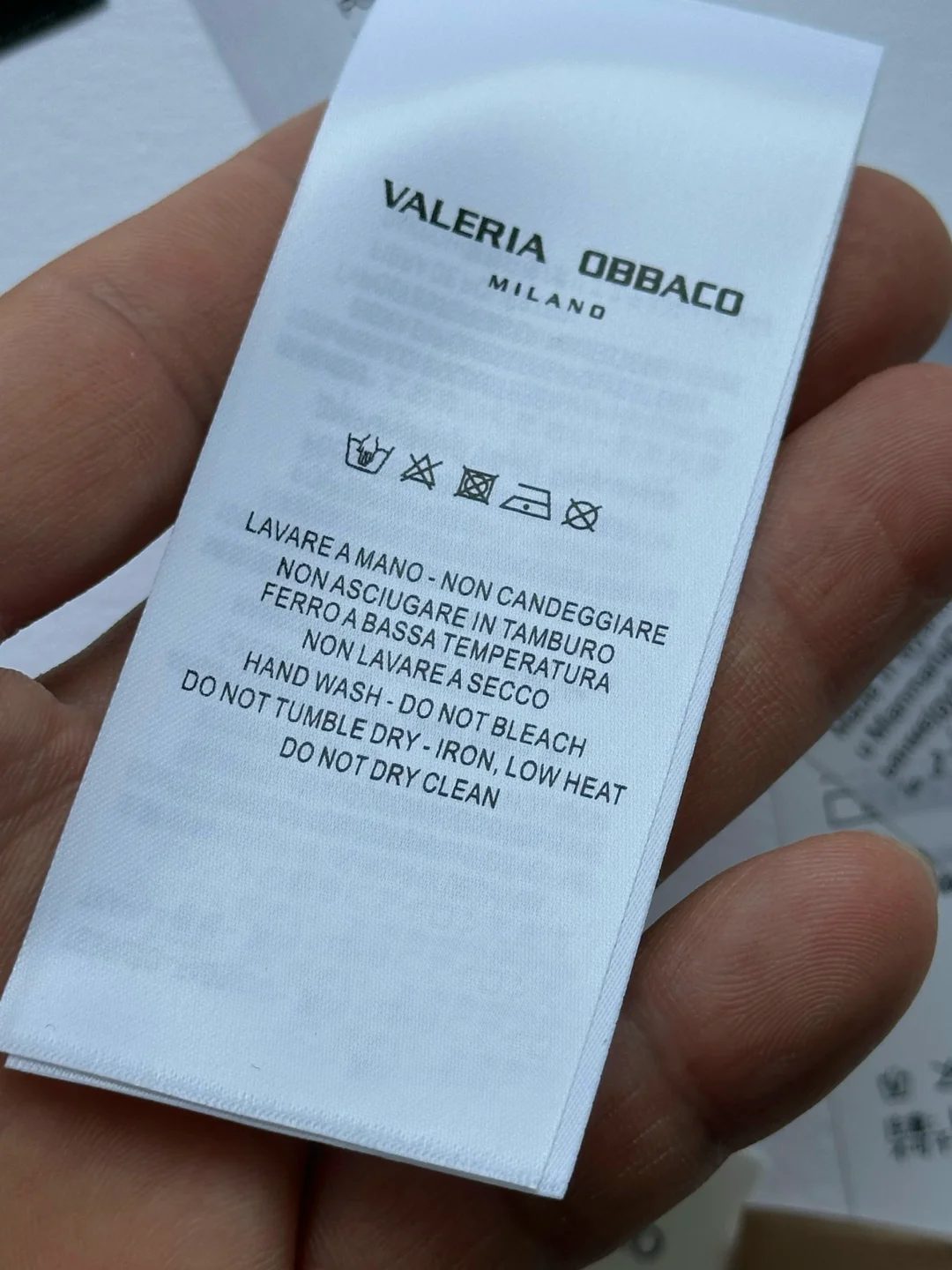 Printed wash care label for garment manufacturing