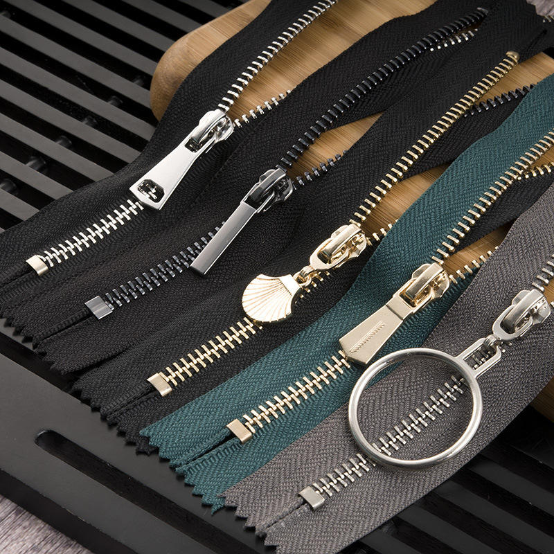 Metal zipper pulls for custom clothing brands