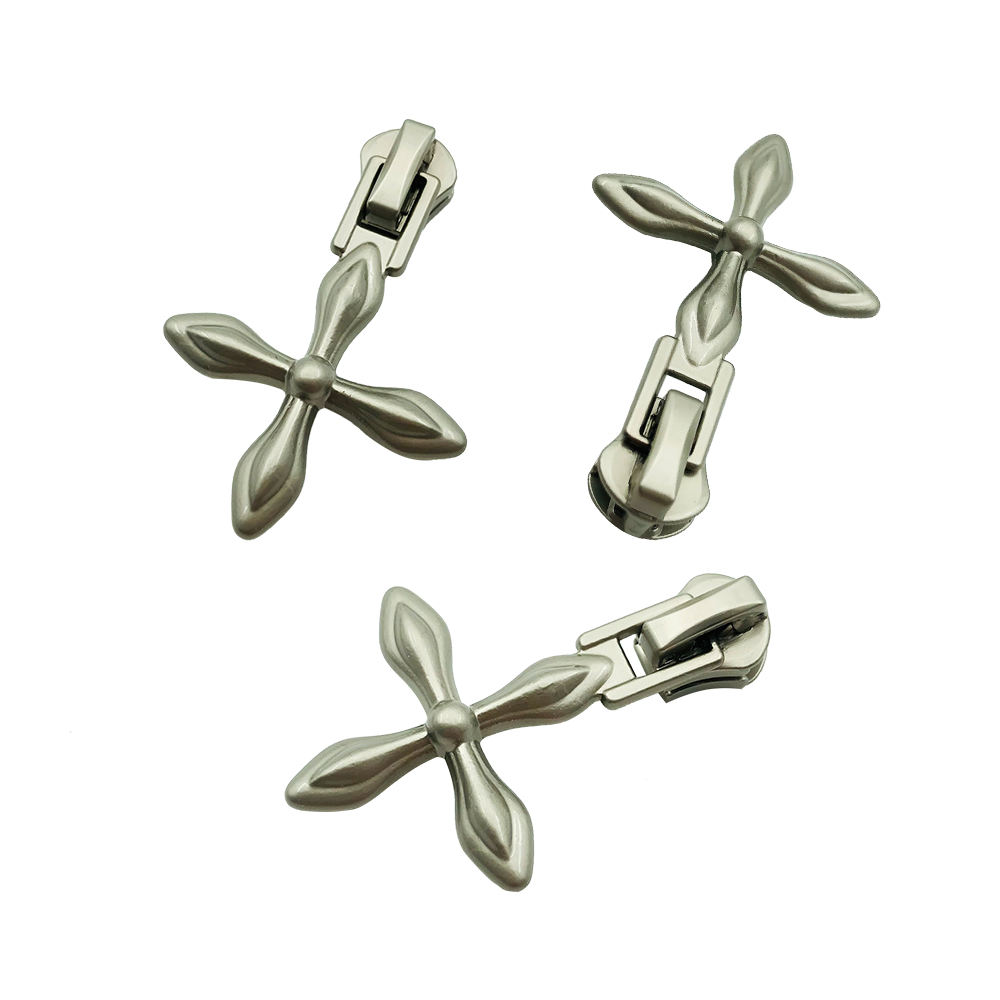 Custom branded zipper pulls for garment manufacturing