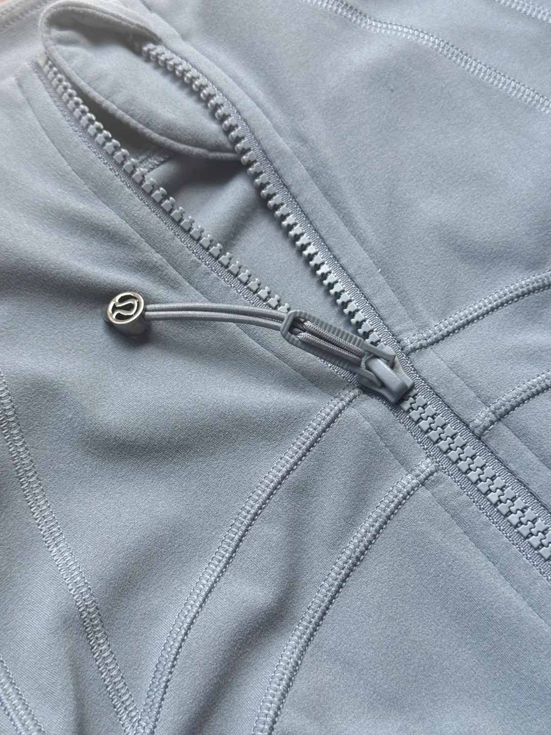 Custom zippers for apparel manufacturing and garment production